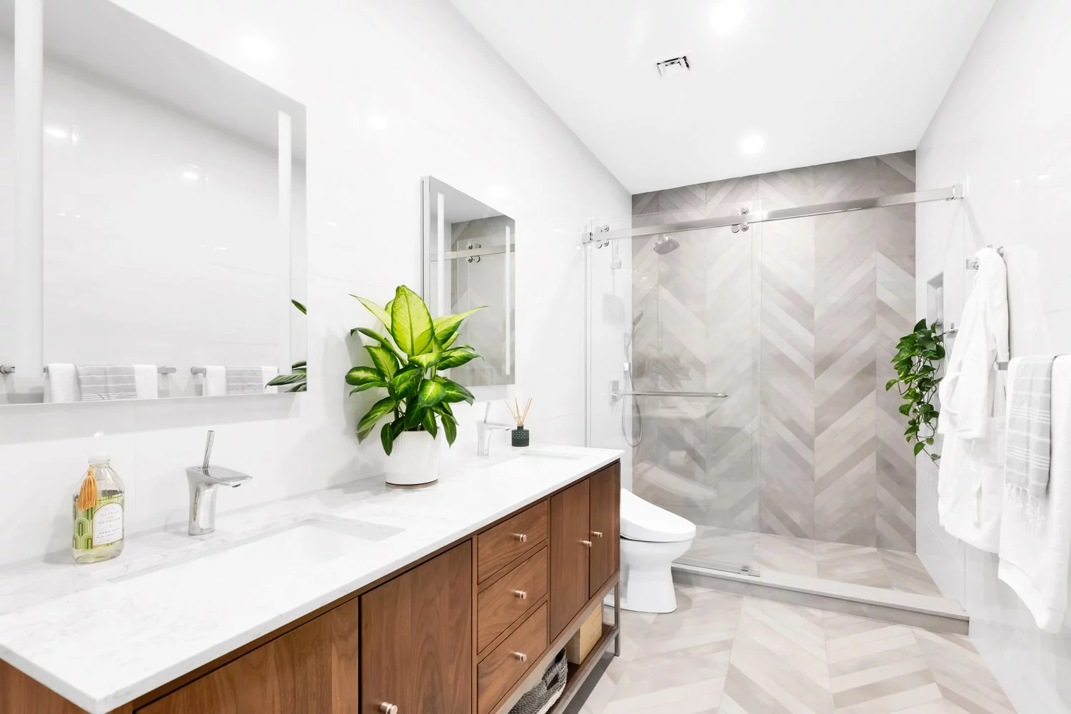 Bright, freshly remodeled bathroom by J&B Contractors